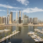 Panoramic view of Dubai Canal and Downtown skyline showcasing premium listings managed by a top Realestate agency in Dubai.
