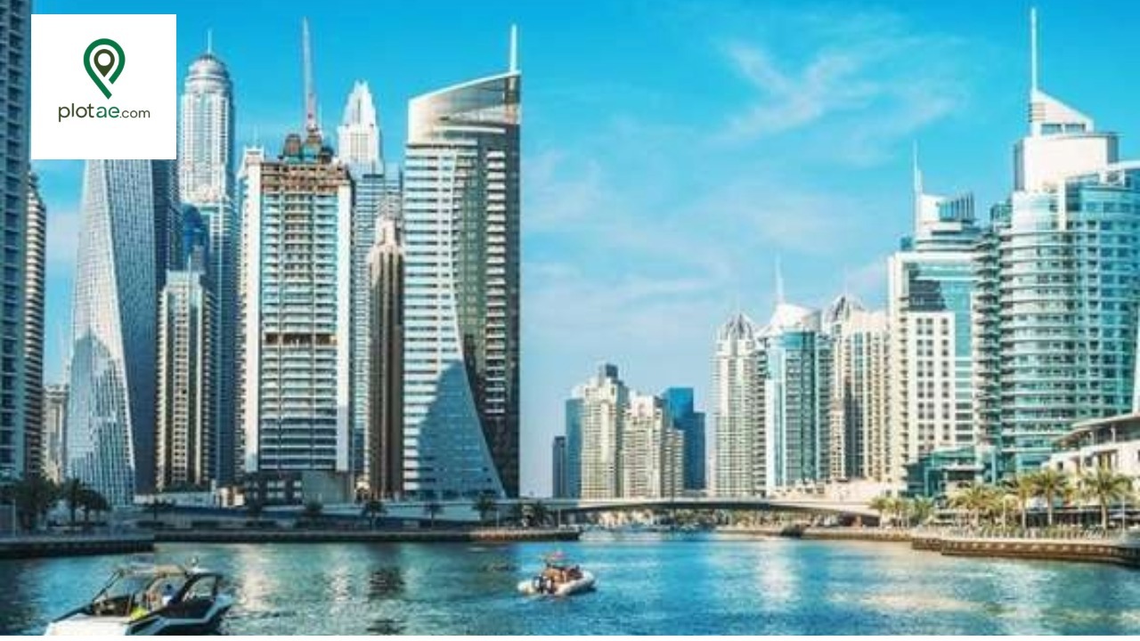 Downtown Dubai land listings overlooking waterfront and luxury high-rise buildings